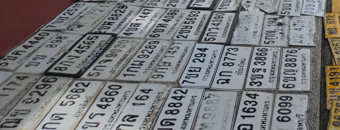 ภาพขยายป้าย 7ขข 2515 ในรูปกองป้าย