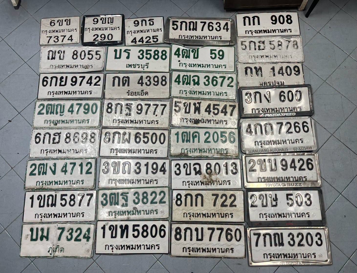 ภาพขยายป้าย บม 7324 ในรูปกองป้าย