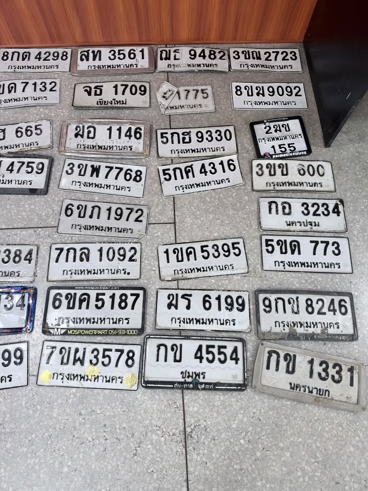 ภาพขยายป้าย 2มข 155 ในรูปกองป้าย