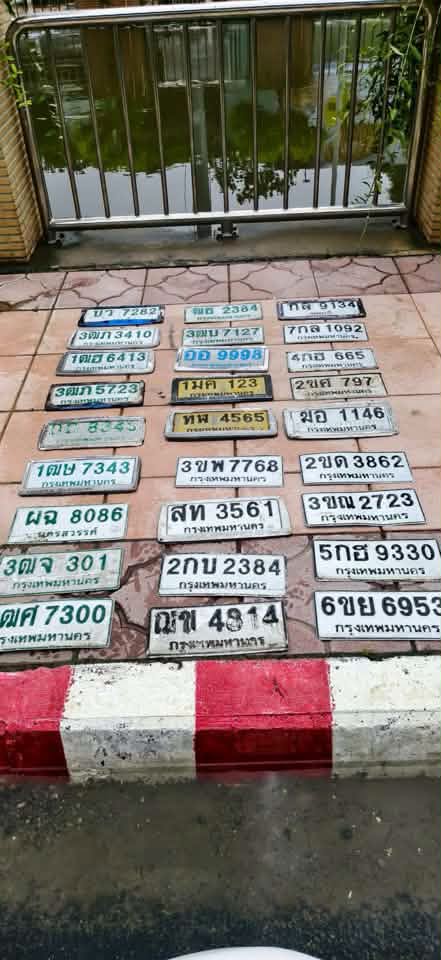 ภาพขยายป้าย ?ล 9134 ในรูปกองป้าย